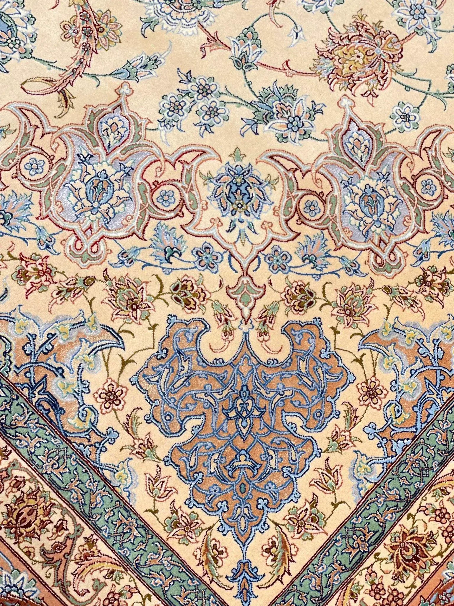 "Detailed close-up of Persian rug craftsmanship, floral silk and wool design"